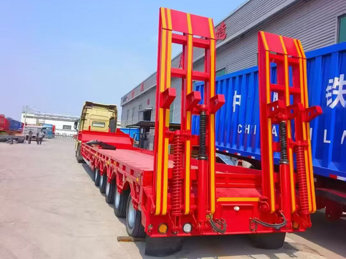 Multi axle low flatbed semi-trailer
