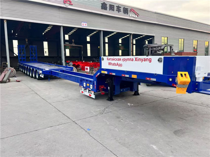 Multi axle pull-out low flatbed semi-trailer